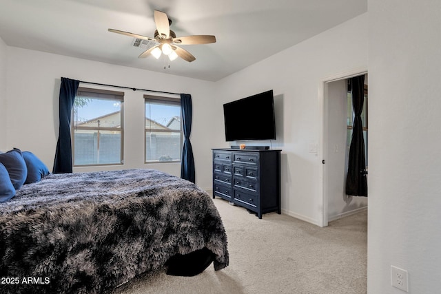4595 W Foldwing Dr, San Tan Valley, AZ 85144 - bedroom featuring light colored carpet, baseboards, and a ceiling fan