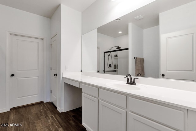 4595 W Foldwing Dr, San Tan Valley, AZ 85144 - full bathroom featuring wood finished floors, vanity, and a shower with shower door