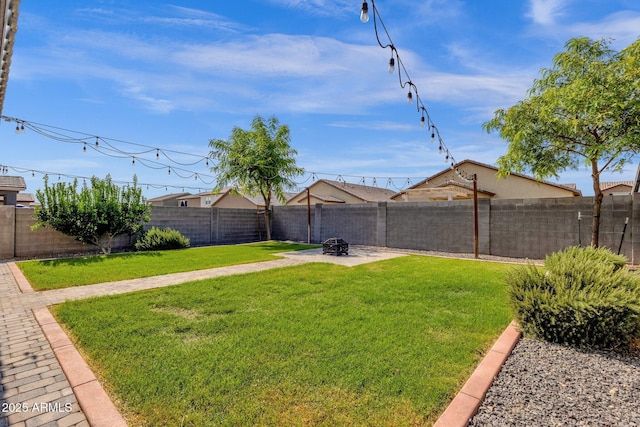4595 W Foldwing Dr, San Tan Valley, AZ 85144 - view of yard featuring a fire pit and a patio area