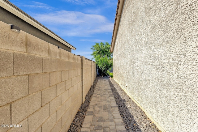 4595 W Foldwing Dr, San Tan Valley, AZ 85144 - view of side of home featuring stucco siding