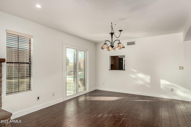 13128 N 104th Pl, Scottsdale, AZ 85260 - empty room with dark wood-style floors, a chandelier, baseboards, and recessed lighting