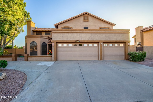 view of front of home with a garage