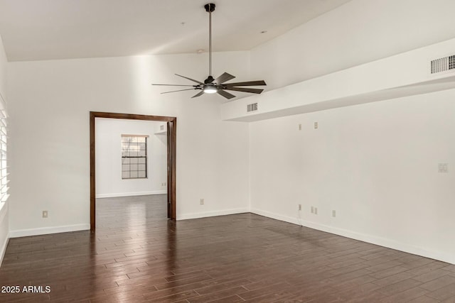 13128 N 104th Pl, Scottsdale, AZ 85260 - spare room featuring ceiling fan, dark wood-style floors, lofted ceiling, and baseboards