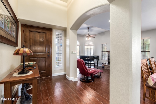 foyer entrance featuring dark hardwood / wood-style flooring and ceiling fan