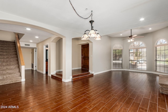 interior space with ceiling fan and dark hardwood / wood-style floors