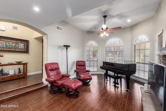 living area featuring ceiling fan