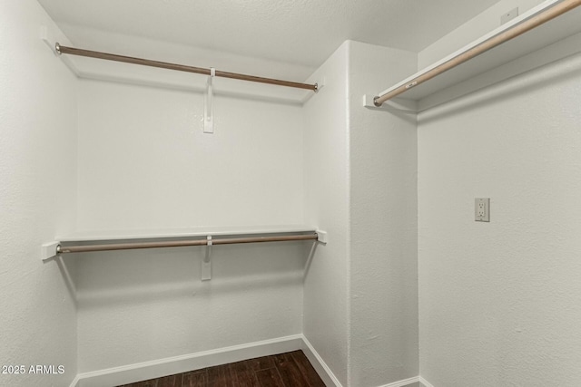 13128 N 104th Pl, Scottsdale, AZ 85260 - walk in closet featuring dark wood-style floors