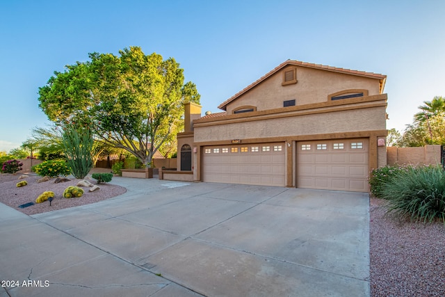 view of front of home featuring a garage