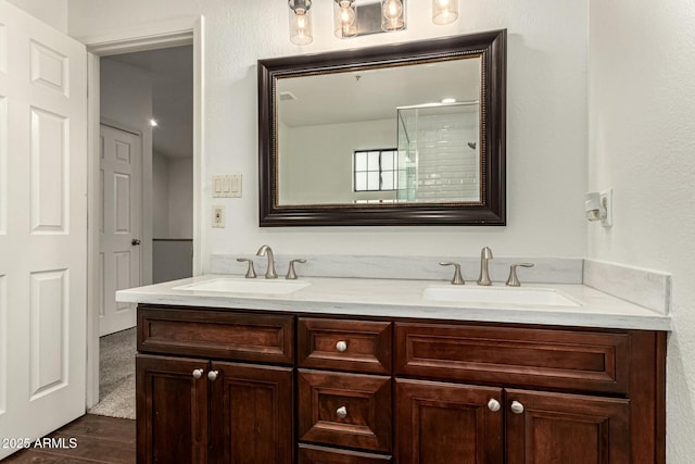 13128 N 104th Pl, Scottsdale, AZ 85260 - full bath featuring double vanity, wood finished floors, and a shower