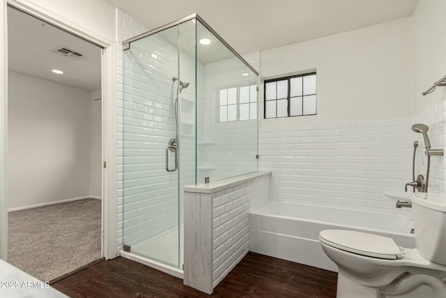 13128 N 104th Pl, Scottsdale, AZ 85260 - bathroom featuring a shower stall, wood finished floors, a bath, toilet, and recessed lighting