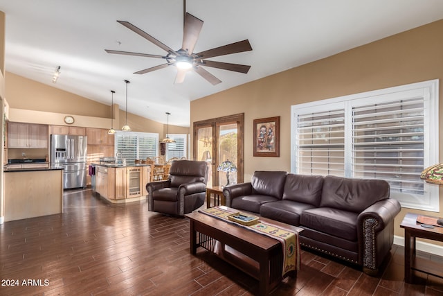 living room with ceiling fan, lofted ceiling, beverage cooler, and dark hardwood / wood-style flooring