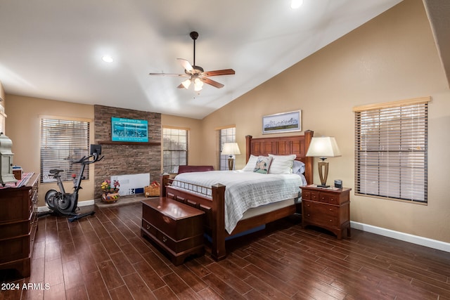 bedroom featuring dark hardwood / wood-style flooring, multiple windows, high vaulted ceiling, and ceiling fan