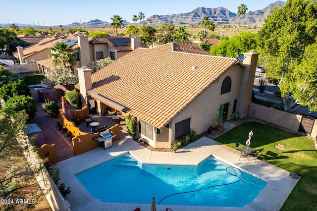 13128 N 104th Pl, Scottsdale, AZ 85260 - view of swimming pool featuring a fenced backyard, a mountain view, and a patio area