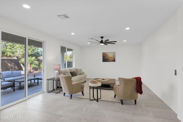 living room featuring ceiling fan