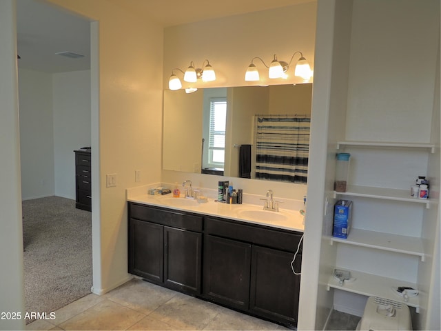 bathroom featuring vanity and tile patterned flooring