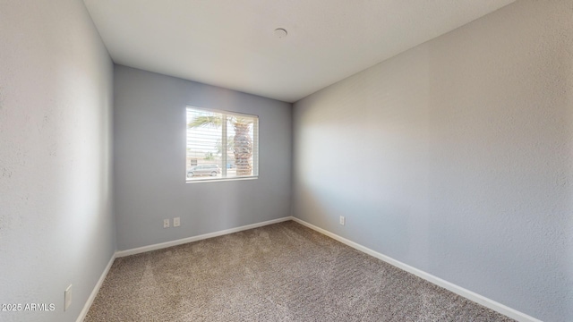 empty room with carpet floors