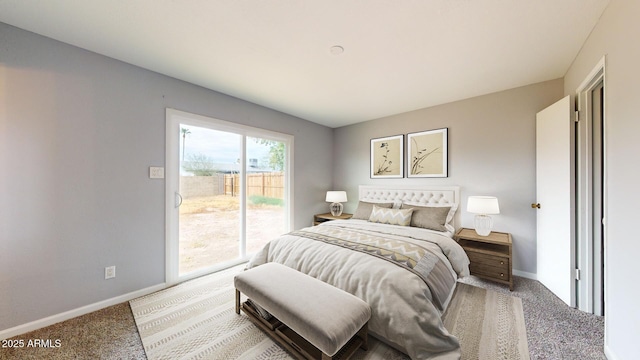 carpeted bedroom featuring access to exterior