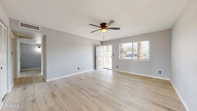 unfurnished room with light hardwood / wood-style floors and ceiling fan