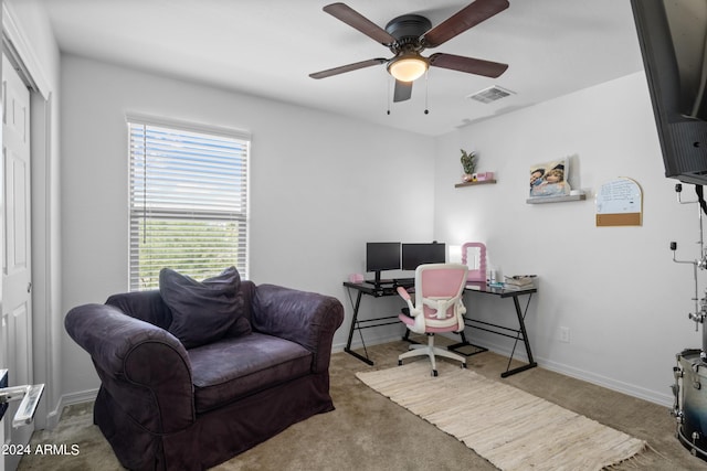 office with ceiling fan, carpet flooring, visible vents, and baseboards