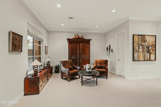 living area with carpet, crown molding, visible vents, and baseboards