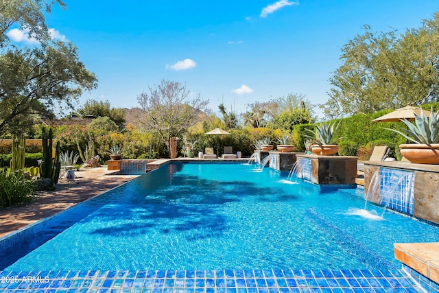 pool featuring a patio area