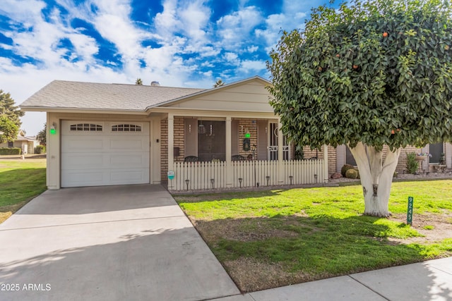 view of front of house with a garage and a front yard