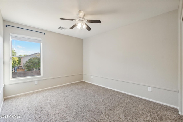 unfurnished room featuring carpet floors and ceiling fan