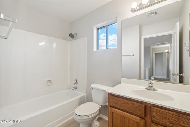 full bathroom with shower / bathing tub combination, vanity, and toilet