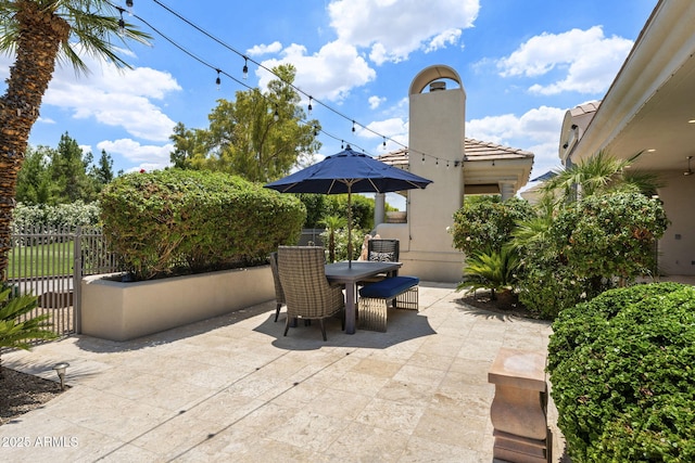 7475 E Gainey Ranch Rd Unit 22, Scottsdale, AZ 85258 - view of patio / terrace featuring outdoor dining space