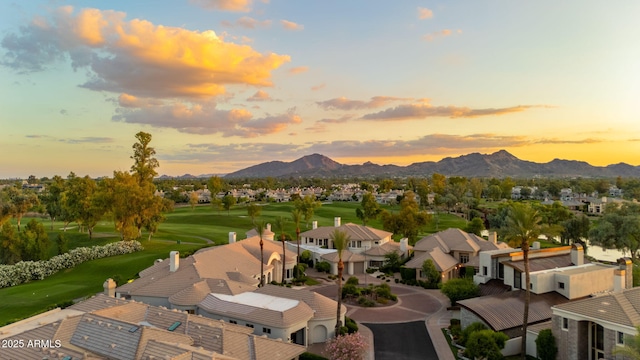 7475 E Gainey Ranch Rd Unit 22, Scottsdale, AZ 85258 - aerial view at dusk of golf course view, a residential view, and a mountain view