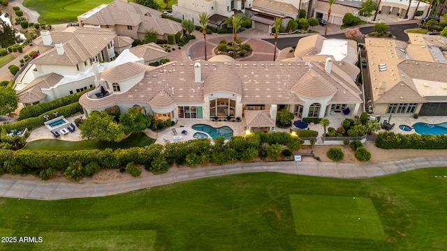 7475 E Gainey Ranch Rd Unit 22, Scottsdale, AZ 85258 - aerial perspective of suburban area featuring a golf course and a pool area