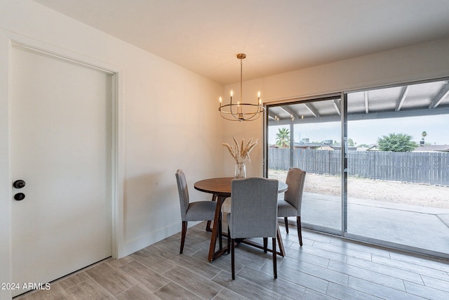 dining room featuring a chandelier