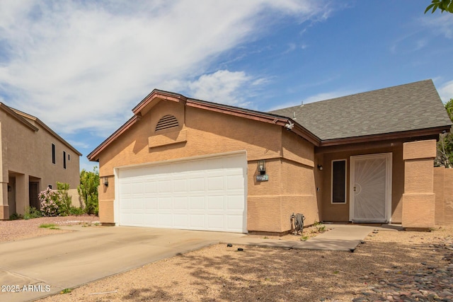 9167 N 73rd Ln, Peoria, AZ 85345 - ranch-style home with an attached garage, concrete driveway, and stucco siding