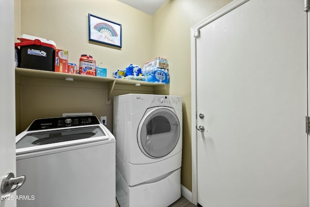 laundry room with separate washer and dryer