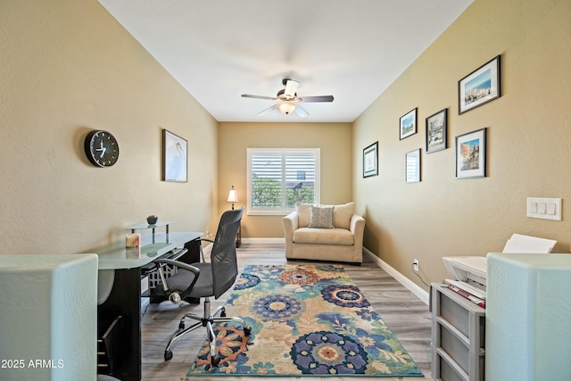 office featuring ceiling fan and wood-type flooring