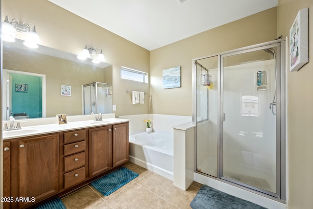 bathroom with tile patterned floors, plus walk in shower, and vanity