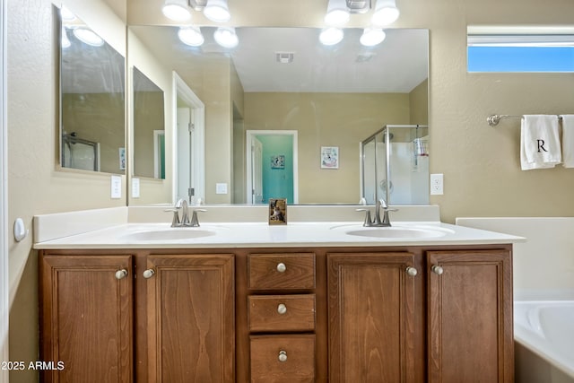 bathroom featuring separate shower and tub and vanity