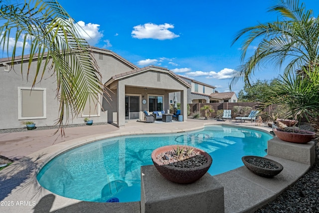 view of swimming pool featuring a patio area and an outdoor hangout area