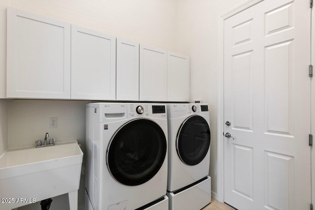 5892 E Evening Glow Dr, Scottsdale, AZ 85266 - laundry room featuring cabinet space, washer and clothes dryer, and a sink