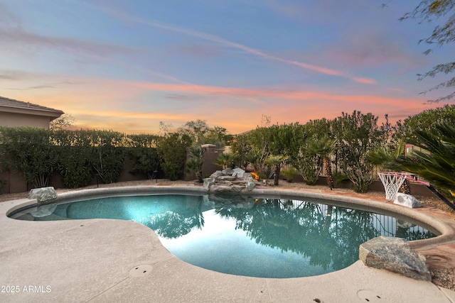 5892 E Evening Glow Dr, Scottsdale, AZ 85266 - pool at dusk featuring fence and a fenced in pool