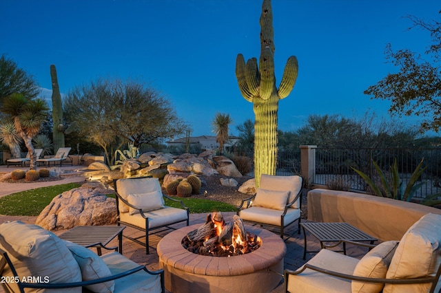 view of patio featuring an outdoor fire pit