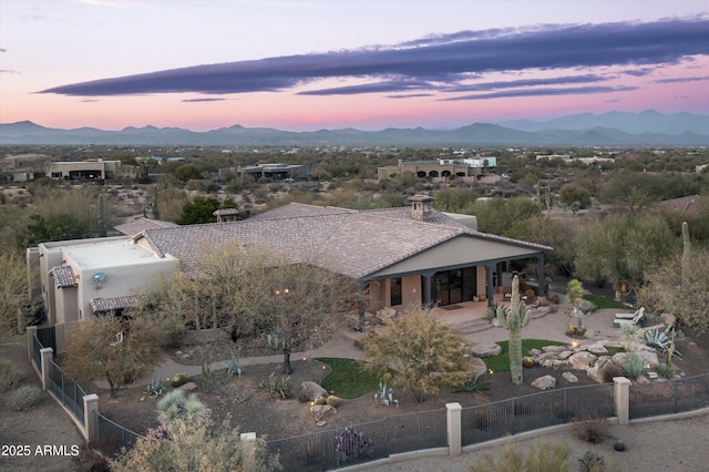 exterior space with a patio and a mountain view