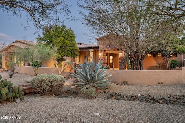 view of pueblo-style home