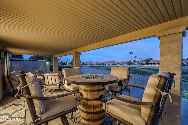 view of patio with a balcony