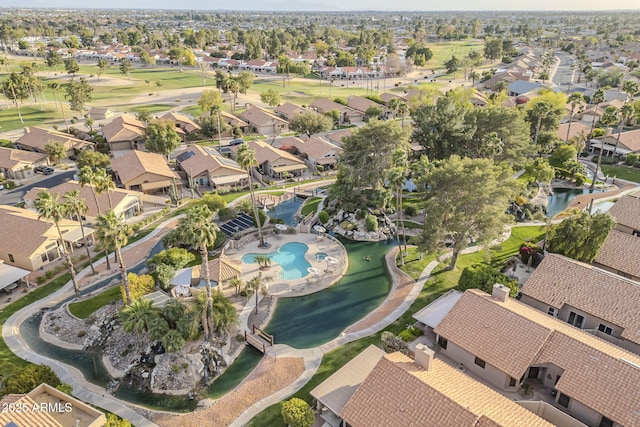 aerial view with a water view and a residential view