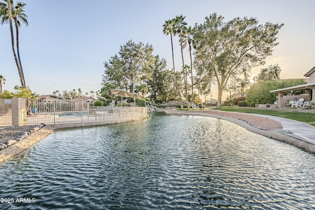 property view of water with fence