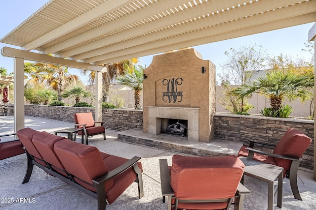 view of patio with an outdoor living space with a fireplace