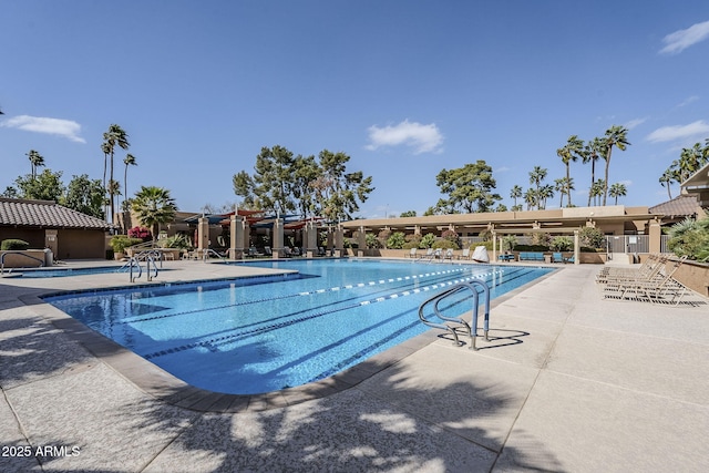 pool with a patio