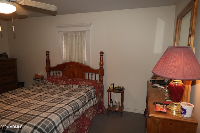 bedroom featuring ceiling fan and carpet floors