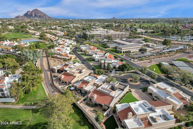 birds eye view of property featuring a mountain view